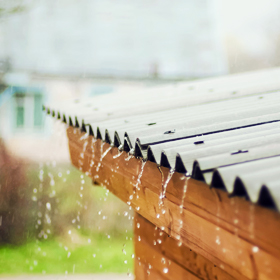 Rain falling off a metal roof